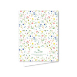 Notebook with floral pattern on a white background