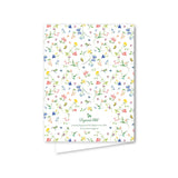 Notebook with floral pattern on a white background