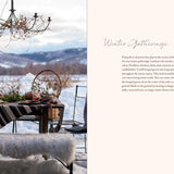 Winter gathering scene with a table by a lake, mountains in the background, and text on the right.