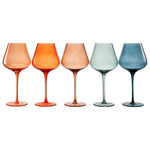 Five colorful wine glasses on a white background