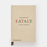 Beige book titled 'Contemporary Eataly Italian Cooking' by Phaidon on a white background