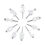 Set of white number cake toppers arranged in a circular pattern on a white background.