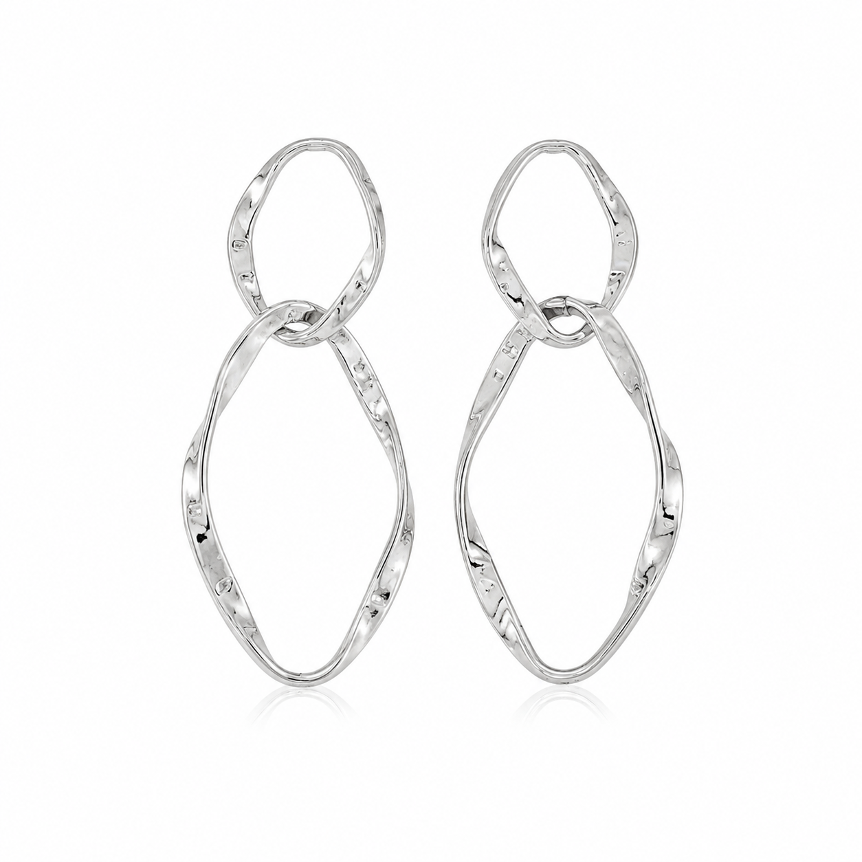 A pair of silver drop earrings with organic, wavy open-loop shapes, displayed on a clean white background with a subtle reflection.