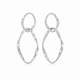 A pair of silver drop earrings with organic, wavy open-loop shapes, displayed on a clean white background with a subtle reflection.