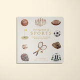 Book titled 'Our Big Book of Sports' with sports-themed illustrations on a beige background