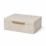 Beige jewelry box with a gold handle on a white background