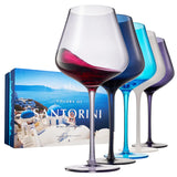 Set of colorful wine glasses with a 'Colors of Santorini' box in the background.