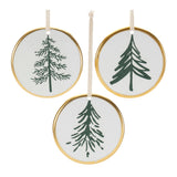 Three circular ornaments with green tree designs and gold frames on a white background.