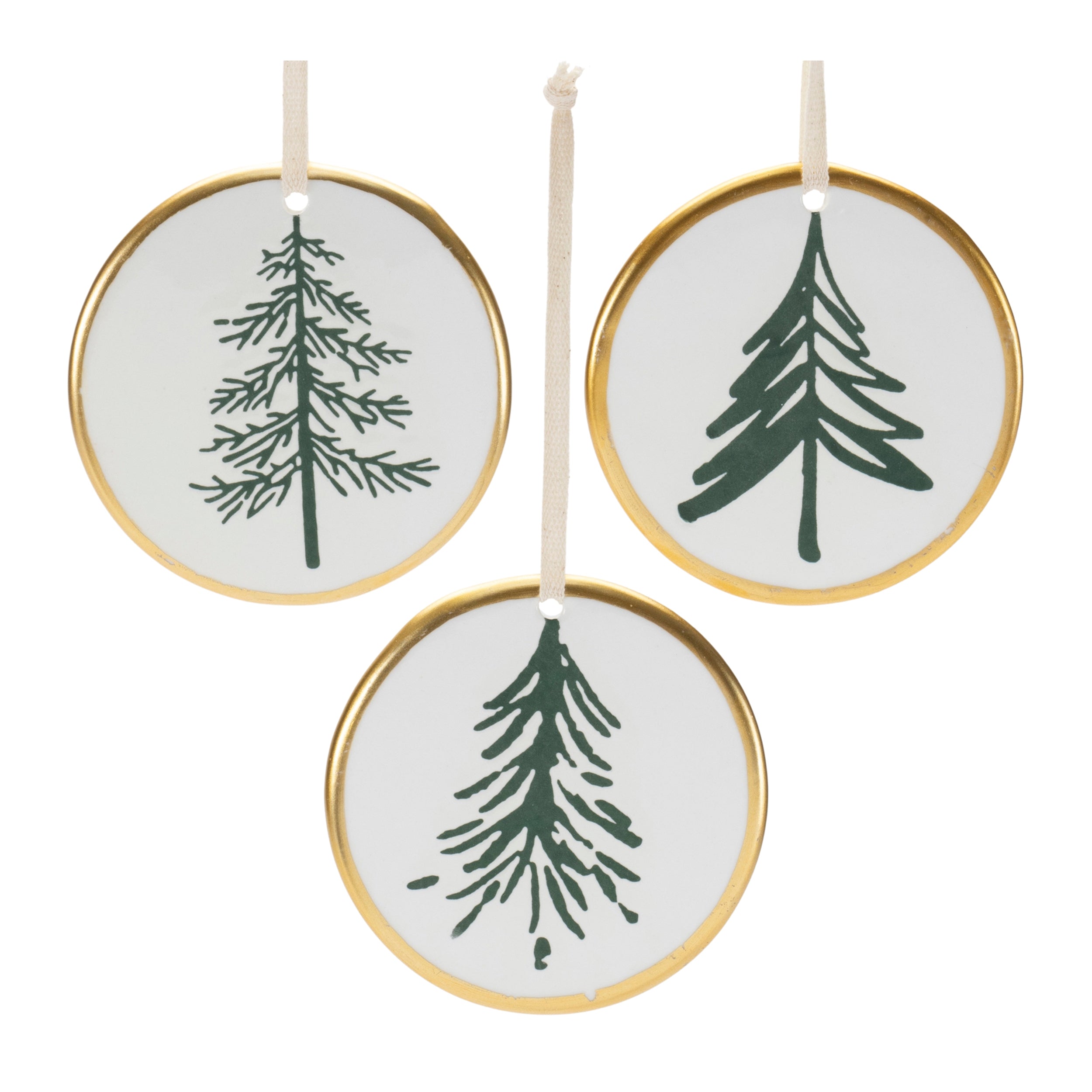 Three circular ornaments with green tree designs and gold frames on a white background.