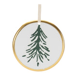 Round ornament with a green tree design on a white background