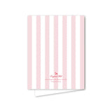Notebook with pink and white vertical stripes on a white background