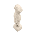Abstract beige cement human body sculpture with an elongated silhouette, textured stone-like finish, and minimalist design on a rectangular base on white background