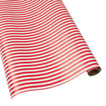 Roll of red and white striped paper on a white background