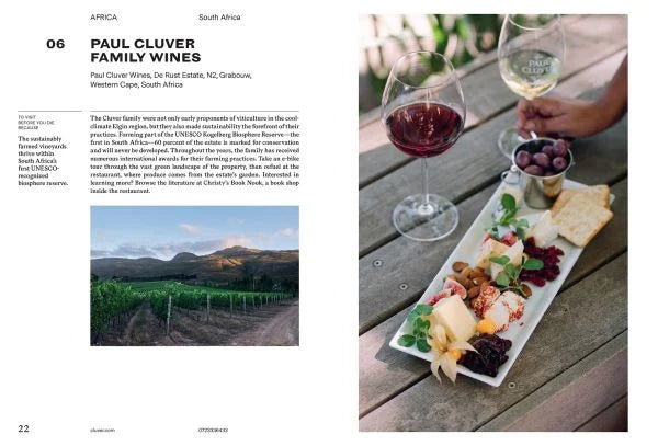 Magazine spread featuring Paul Cluver Family Wines with wine glasses, food platter, and vineyard photo.