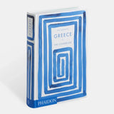 Blue and white book titled 'Greece: The Cookbook' by Phaidon on a light gray background