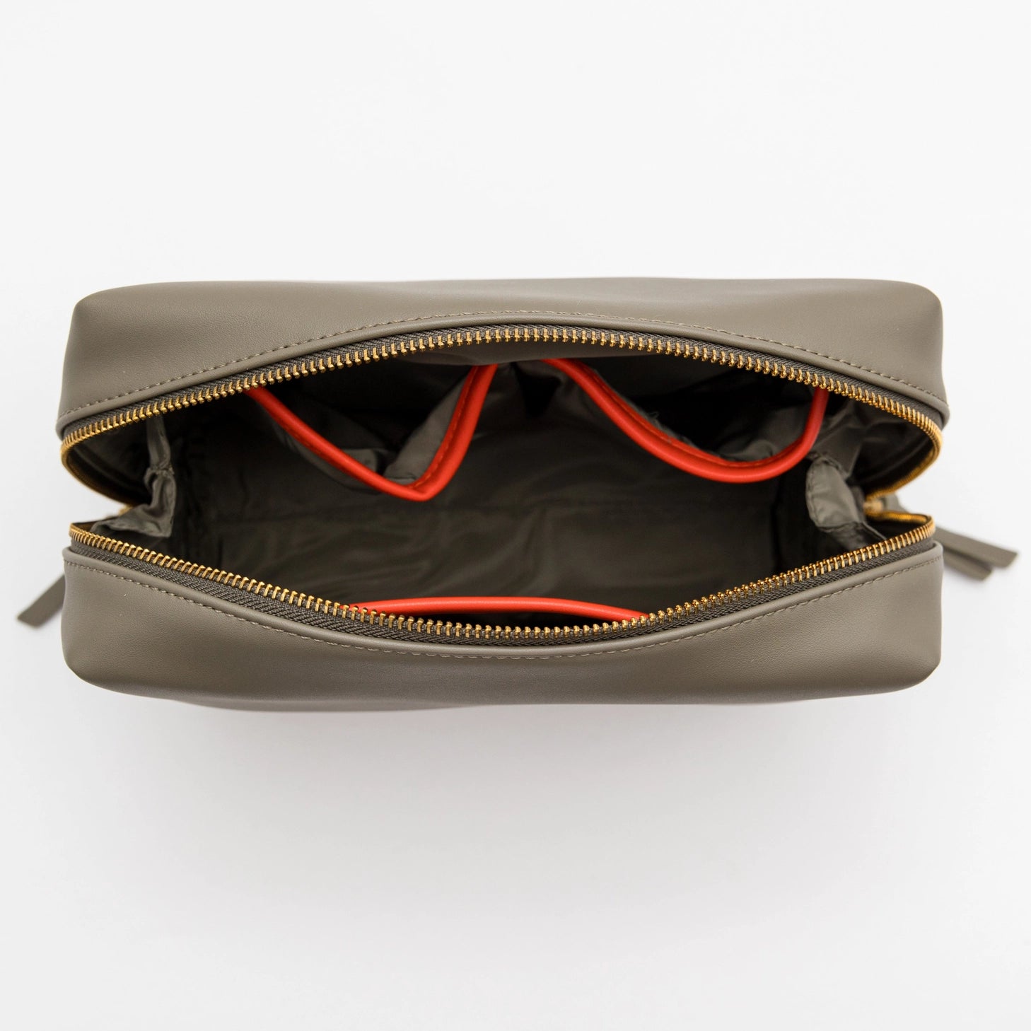 Open  Montemare Roma Standing Toiletry Case in Olive with red interior lining on a white background