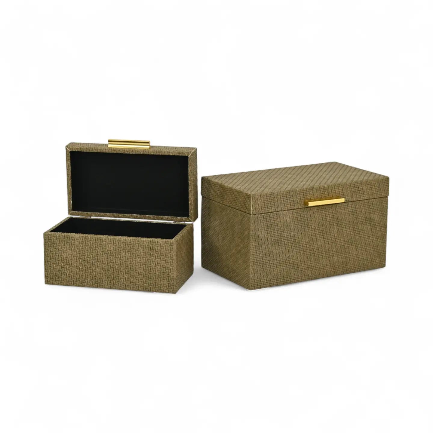 Two gold storage boxes with black interiors on a white background