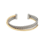 Braided bracelet with gold and silver accents on a white background