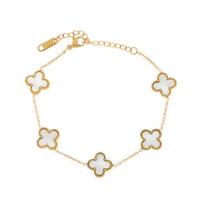 gold chain bracelet with five clover-shaped white enamel charms