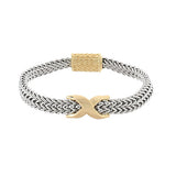 Bracelet with gold 'X' charm and two-tone design on a white background