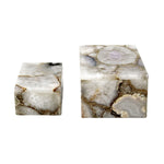 Two marble-patterned boxes on a white background