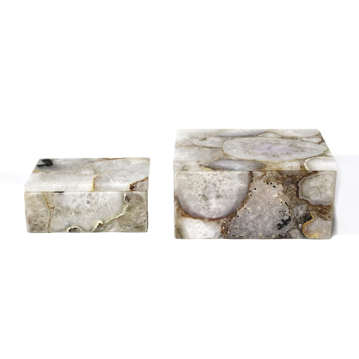 Two marble-like rectangular objects on a white background