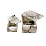 Marble-patterned jewelry box with a lid open on a white background