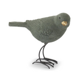 green velvet bird with gold beak, style a turned head