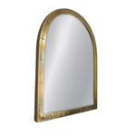 Arched mirror with gold frame on a white background