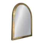 Arched mirror with gold frame on a white background