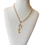 Necklace features a gold braided chain link design that can be worn long or doubled up for a layered look.