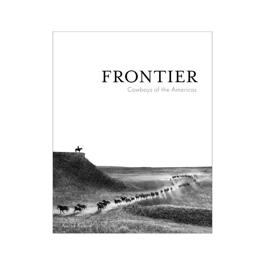 HARDCOVER BOOK, FRONTIER: COWBOYS OF THE AMERICAS" ON WHITE BACKGROUND
