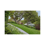 image of a greenhouse on a green hillside from Hardcover Book, "Worlds Best 50 Gardens from around the Globe", on a white background