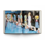 open page view of a fashion runway showing from the hardcover book "New York. In Fashion" on a white background