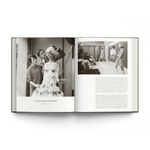 open book view showing a vintage fashion photos from the hardcover book "London. In Fashion" on a white background