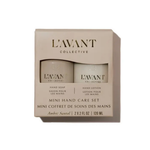 L'avant Collective Mini Hand Care Set in Ambre Santal, featuring a beige box containing a hand soap and a hand lotion bottle, shown on a white background.