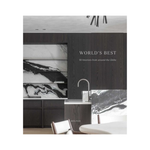 hardcover book "world's best: 50 interiors from around the globe" on a white background