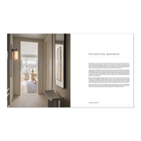 an image of an open book titled 'Novodevichy Apartment' with a photograph of a modern apartment hallway and interior on the left and descriptive text on the right from hardcover book "WORLD'S BEST III"  on a white background