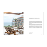 an image of an open book showing a photograph of an outdoor balcony with two wooden lounge chairs, a table, and a modern apartment building overlooking the sea, alongside property text reading 'Apartmente Bravissima II' from hardcover book "WORLD'S BEST III"  on a white background