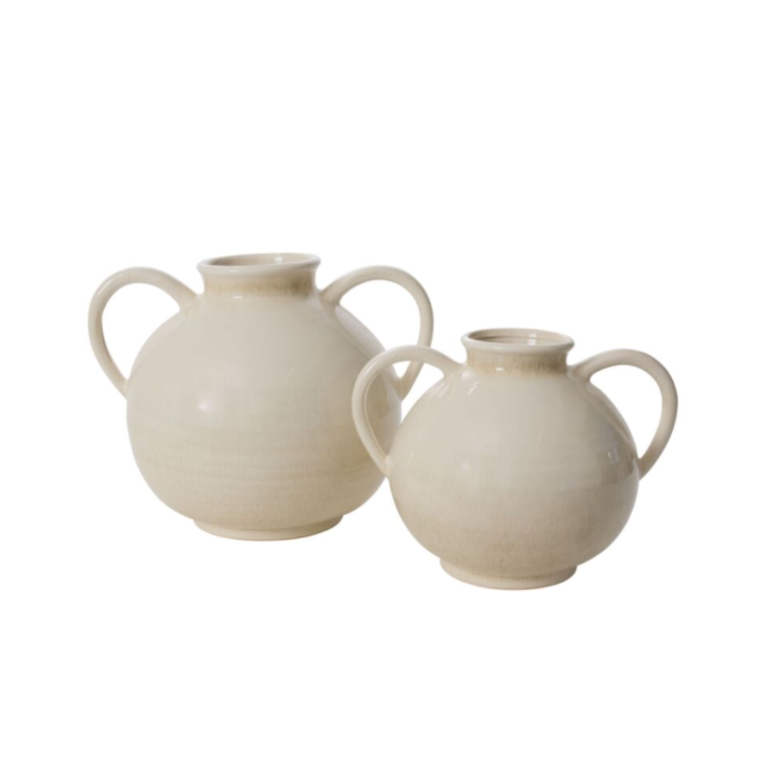 Two cream-colored ceramic vases with loop handles, one larger and one smaller, shown on a plain white background.