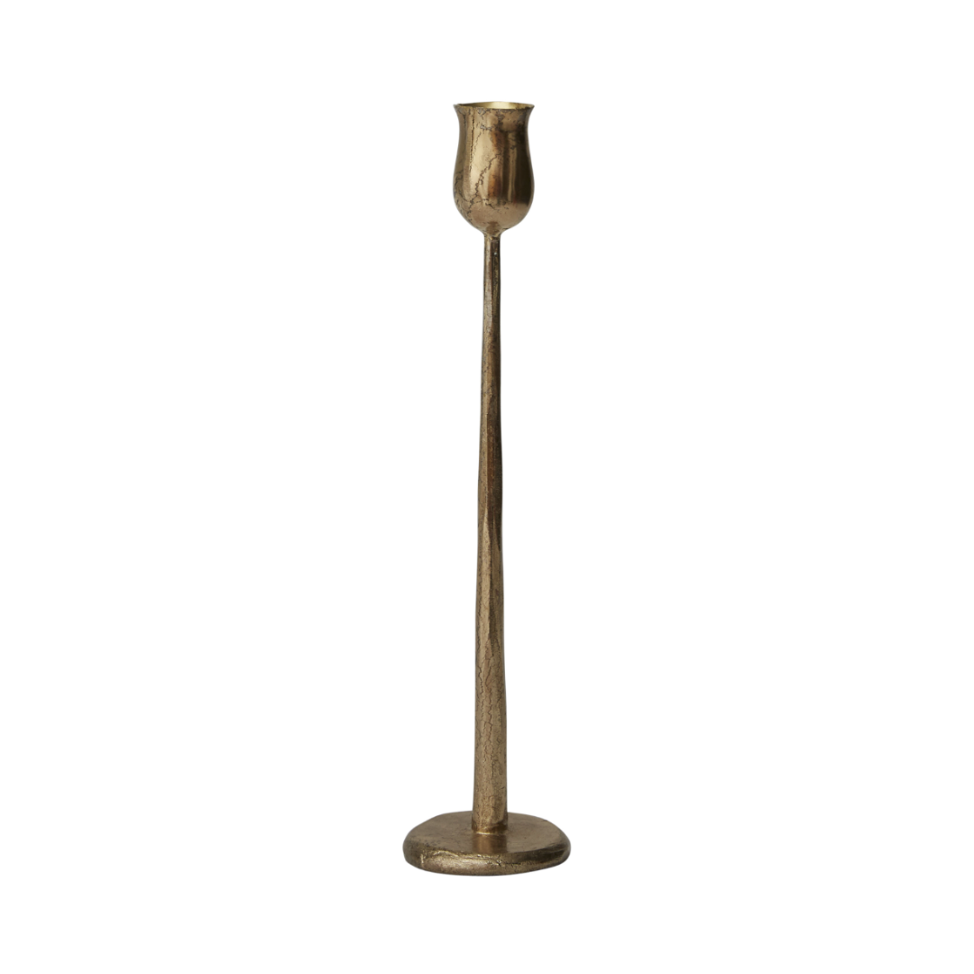 antique gold candestick on a white background