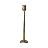 antique gold candestick on a white background
