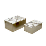 Two marble-top boxes on a white background