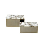 Two marble-patterned boxes on a white background