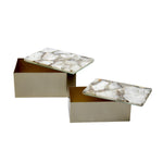 Two decorative boxes with marble lids on a white background