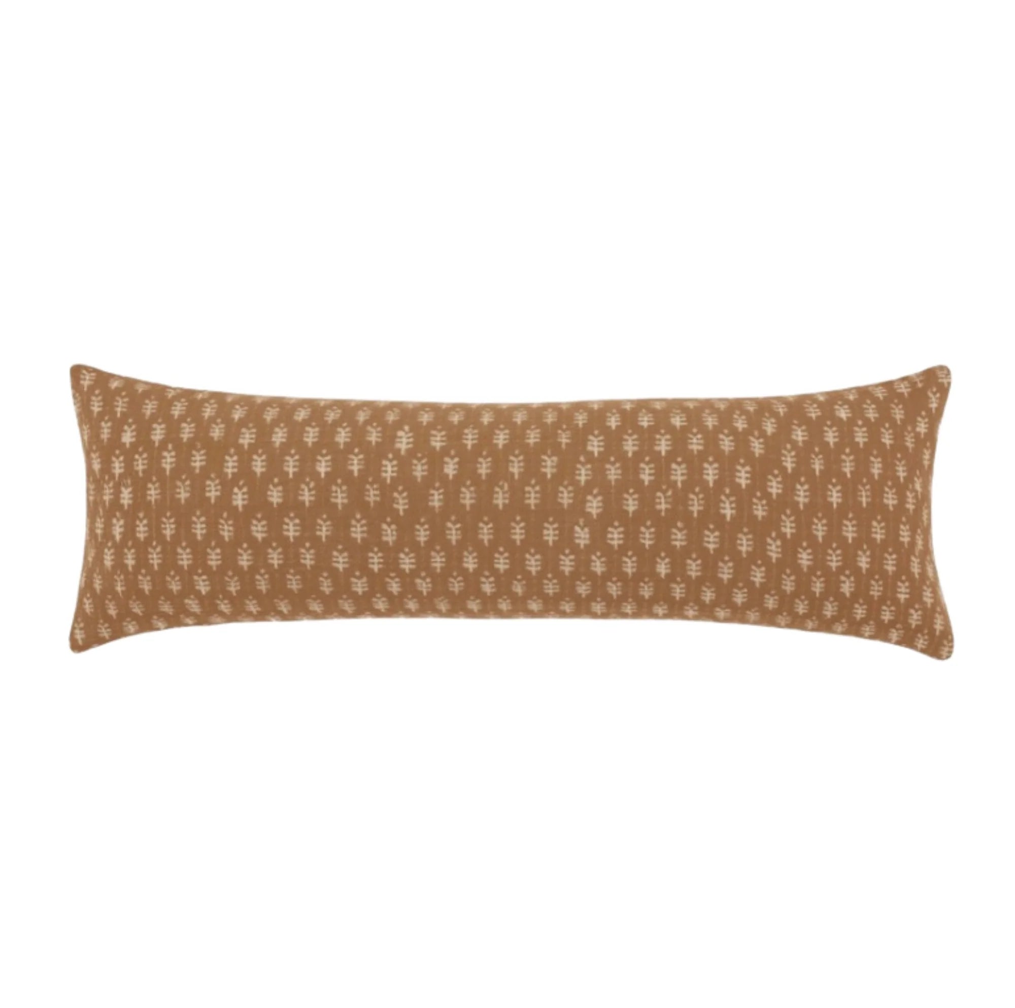 Brown patterned pillow on a white background
