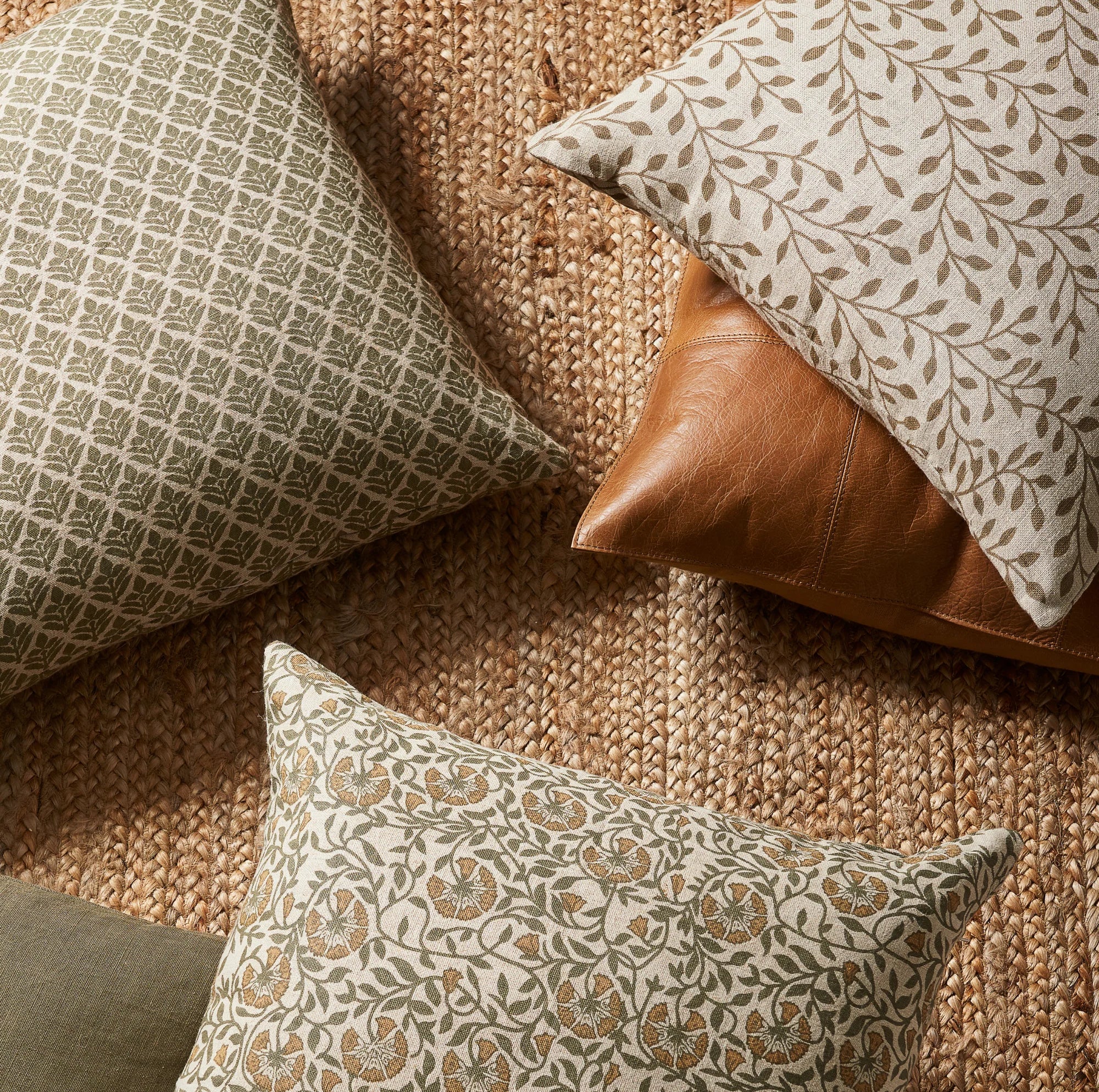 Patterned pillows on a textured surface