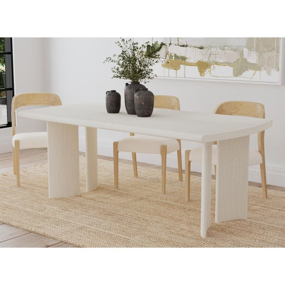 Dining table with chairs and decorative vases in a modern room.