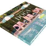 Book titled 'Dogs' with a colorful cover featuring images of dogs and people.