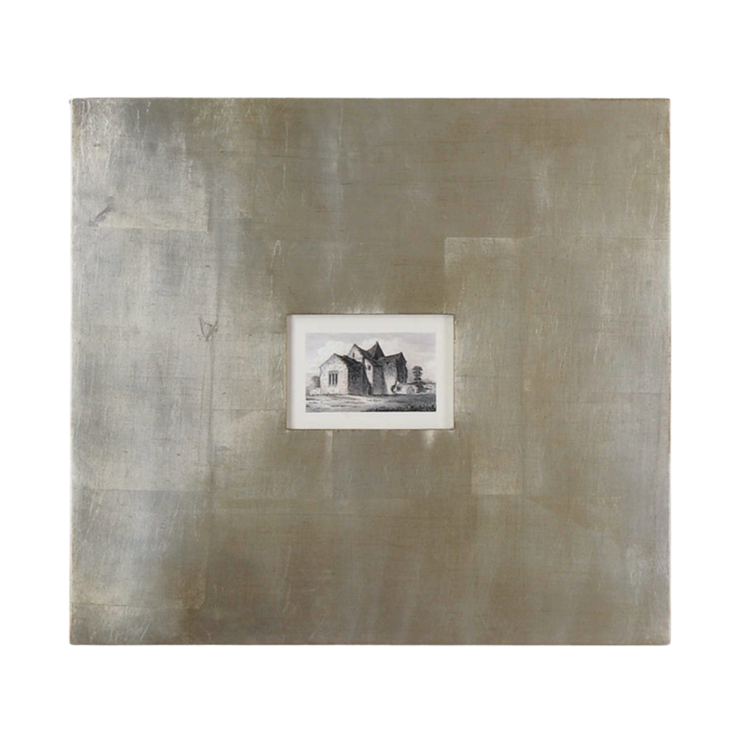 framed black-and-white architectural building print with wide champagne silver leaf frames and light brown glaze